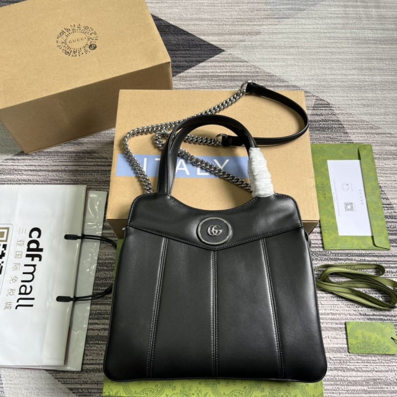 G*u*i top handle bags